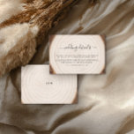 Cartão De Informações Rustic Tree Ring Wood Grain Wedding Details<br><div class="desc">Share all your important wedding information in style with this rustic details card featuring a soft wood grain tree ring background and elegant black script “wedding details” heading. Use the customizable text to add accommodations, reception details, transportation info, dress code, wedding website, or any extra notes your guests need for...</div>