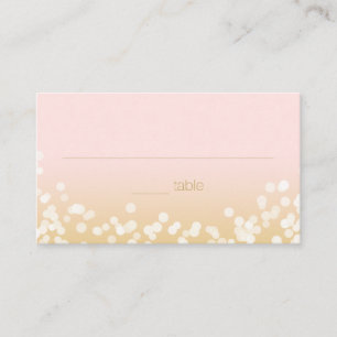Cartão De Lugar Coram o rosa e o assentamento Dourado das luzes da