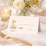 Cartão De Mesa Pearls Prosecco pink bow Bridal Shower<br><div class="desc">Decorate your event with these elegant bridal shower place cards. The design features a watercolor champagne flute filled with golden bubbles and accented by a delicate pearl-encrusted bow against a soft blush background. These cards are perfect for seating guests at a pearls and prosecco bachelorette brunch or high-end engagement party....</div>