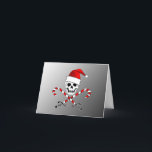 Cartão de Natal alegre 2 do papai noel de Roger do<br><div class="desc">Yo, Ho Ho Ho! Este Roger alegre está pronto para um Natal do pirata, termina com seus chapéu do papai noel e bastões de doces cruzados. Dentro de diz "Yo, Ho, Ho, Ho! Tenha um feriado alegre de Roger", acompanhado da cara de sorriso alegre, mas este é um modelo assim...</div>