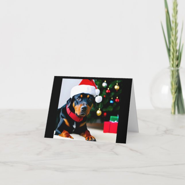 Cartão de Natal com Rottweiler vestindo chapéu de  (Frente)