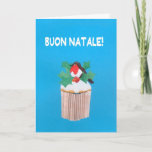 Cartão de Natal, italiano, cupcake com pisco de<br><div class="desc">Um cartão de Natal italiano brilhante e alegre com um papo-roxo empoleirou-se entre o azevinho sobre um cupcake congelado, de uma colagem de papel pintado à mão por Judy Adamson. O cumprimento dianteiro, no texto branco em um fundo azul, é "Joyeux Noel!" e a mensagem interna, que você pode mudar,...</div>