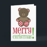 Cartão de Natal listrado do urso<br><div class="desc">Um cartão de Natal que caracteriza uma ilustração de um marrom encheu o urso com as patas e as orelhas listradas vermelhas e brancas.  O texto vermelho e verde diz o "Feliz Natal!"</div>