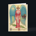 Cartão de Natal Vintage Angel<br><div class="desc">Um belo anjo da vintagem aparece neste Cartão de Natal com lindas asas lacrimogêneas e uma cena da natividade. Clássica! O dentro verso da placa é editável ou você pode sair como está. Basta adicionar seu nome de família ou nome comercial. Que o espírito do Natal te traga paz, A...</div>