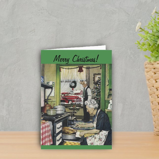 Cartão de Natal Vintage antigo (Vintage image in Grandma kitchen at holidays cooking dinner on green Merry Christmas card.)