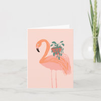 Flamingo Tropical com a mão de plantas plantadas