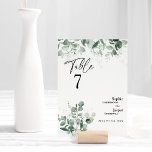 Cartão de Número da Mesa Branca de Casamento Moder<br><div class="desc">Esta design da mesa de casamento branca e verde moderna apresenta fácil mistura e combinar estilos de coordenação em preto e branco com elementos verdes delicados, acrescentando um florescimento gracioso em torno de uma simples tipografia sofisticada e um belo roteiro de caligrafia mínimo. A aquarela eucalipto e outras folhas botânicas...</div>