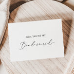 Cartão de Proposta Delicado de Bridesmaid<br><div class="desc">Esta delicada carta de proposta de madrinha de caligrafia é perfeita para um casamento moderno. A design romântica minimalista apresenta uma magnífica e elegante tipografia negra num fundo branco com um aspecto simples e limpo. Personalize a placa com o nome da noiva e da dama de honra. Personalize a parte...</div>