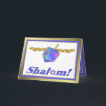 Cartão de Shalom Hanukkah<br><div class="desc">Cartão de Hanukkah com dreidel,  moedas de ouro e Shalom no roxo e nos tons do ouro.</div>
