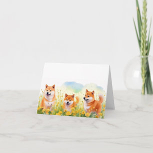 cartão de três shiba inus e dandelions fofos