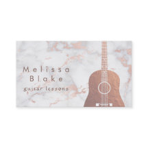 professor de música faux rosa gold guitar no mármo