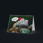 Cartão do Natal da iguana do papai noel<br><div class="desc">Agora não olha totalmente feliz? Tenha pouco divertimento enviando este cartão ao Scrooge que você conhece.   Projetado pelos esforços criativos da luz do sol.</div>