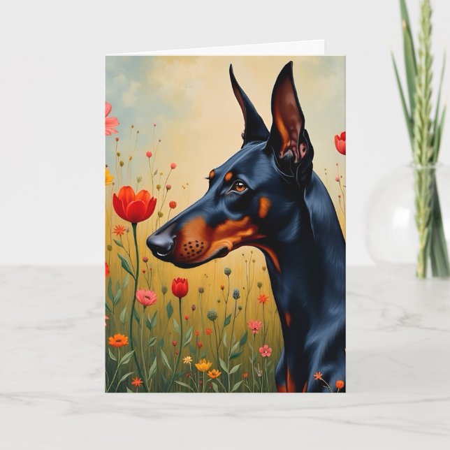 Cartão Doberman num campo de flores (Frente)
