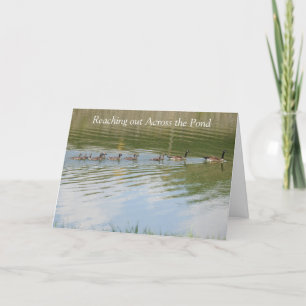 Cartão Estendendo a mão através do oceano para dizer Pens