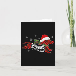Cartão Feliz Cão De Natal Dachshund Através Da Neve