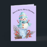 Cartão Feliz de Natal Snowman<br><div class="desc">Feliz cartão de Snowman de Natal. O boneco de neve está sentado em cima de uma xícara com decorações de Natal,  e o cartão é na sua maioria azul e roxo claro. As palavras na dentro podem ser alteradas. Obrigados para a Creative Fabrica para alguns dos elementos na design.</div>