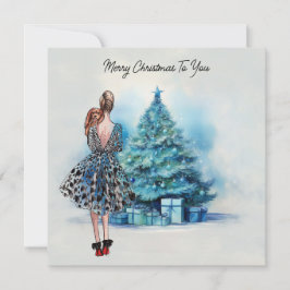 Cartão Feliz Natal, mulher e árvore de Natal azul