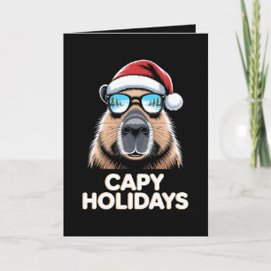 Cartão Férias Capy Natal Capivara Óculos de Sol Papai Noe