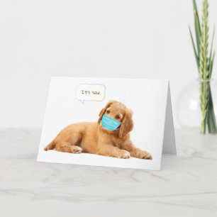 Cartão Filhote de Golden Retriever com máscara facial