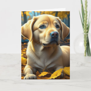 Cartão Filhote de Labrador Amarelo Brincando em Folhas de