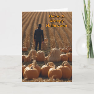 Cartão Homem de Halloween assustador num campo de milho
