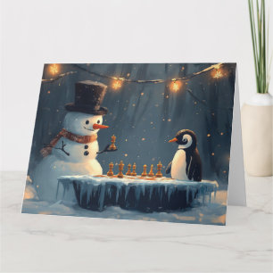 Cartão Homem de Neve Adorável e Pinguim jogando xadrez