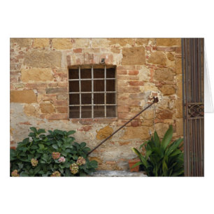 Cartão Janela e antiga parede de pedra, Pienza, Itália