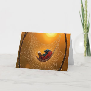 Cartão Joaninha de aniversário em uma rede de aranha