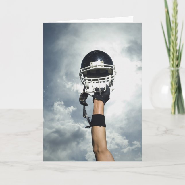 Cartão Jogador de futebol que guardara o capacete no ar (Frente)