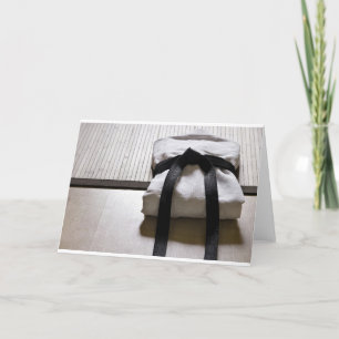 Cartão Judo Gi on Tatami mat