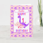 Cartão Kids Dinosaur 1st Birthday Pink<br><div class="desc">A fun 1st birthday card. This bright first birthday card features a cartoon Purple Brontosaurus and a Pink Triceratops, set on a pink and purple dinosaur background A lovely cute design for a little girl who will be one years old. The birthday age and the child's name on the front...</div>