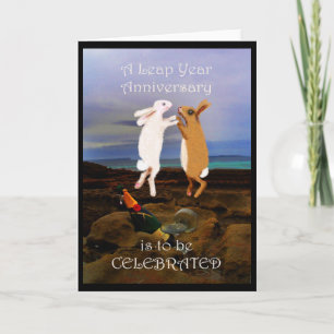 Cartão Leap year Anniversary, two jumping rabbits