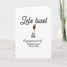 Cartão Let's toast to engagement party name date glass