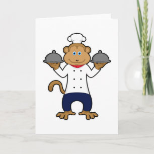 Cartão Macaco como cozinheiro com pratos de servir