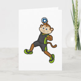 Cartão Macaco em jogador de handebol com handebol