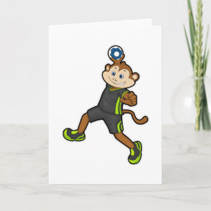 Cartão Macaco em jogador de handebol com handebol