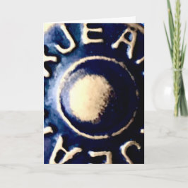 Cartão Macro de um botão de jeans de bronze