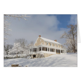 Cartão Mansão de pedra na neve e na luz solar