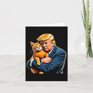 Cartão Meme engraçado do gato laranja abraçando Trump ele