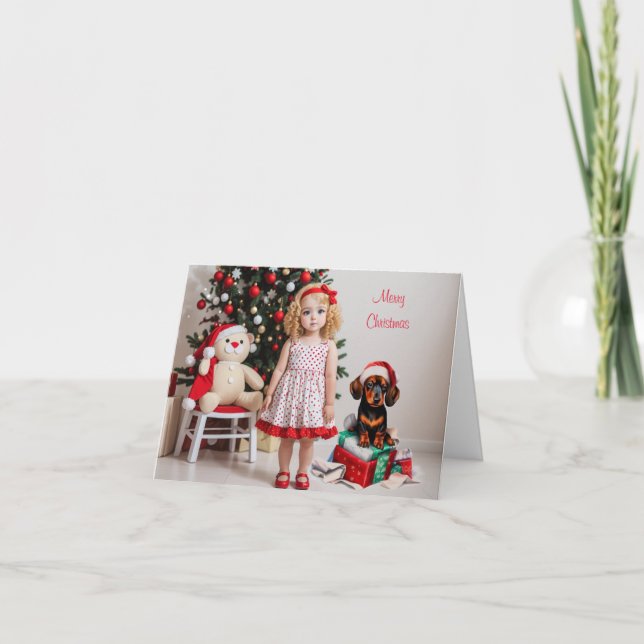 Cartão Menina loira com Natal Dachshund (Frente)