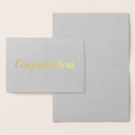 Cartão Metalizado Parabéns Elegante com Script Brushaft Dourado<br><div class="desc">Celebre com esta bela carta! A palavra "Parabéns" aparece em folha de ouro sobre fundo de uma cinza, em uma fonte de script de pincel (pincelada) de estilo manuscrito. A dentro da placa está vazio, pronta para sua mensagem pessoal. Perfeito para um casamento, noivado, aniversário, novo bebê, graduação, novo emprego,...</div>