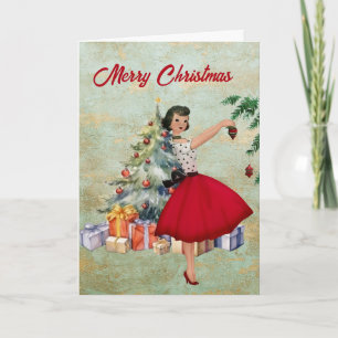 Cartão Mulher do Natal de 1950 com árvore de Natal