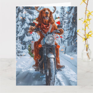Cartão Natal do Cão Vermelho Irlandês a Andar a Moto