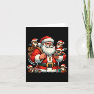 Cartão Papai Noel Americano segurando Platypus presente n