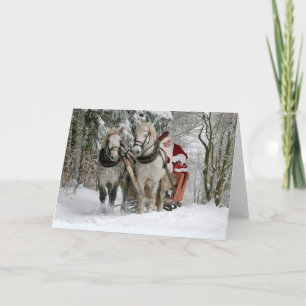 Cartão Papai Noel anda numa carruagem puxada a cavalos