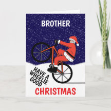 Papai Noel engraçado de bicicleta no Natal Alegre