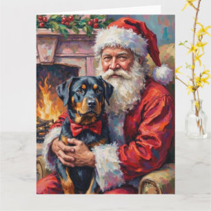 Cartão Papai Noel segurando arte de Natal de Rottweiler
