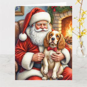 Cartão Papai Noel segurando arte de Natal do Cocker Spani