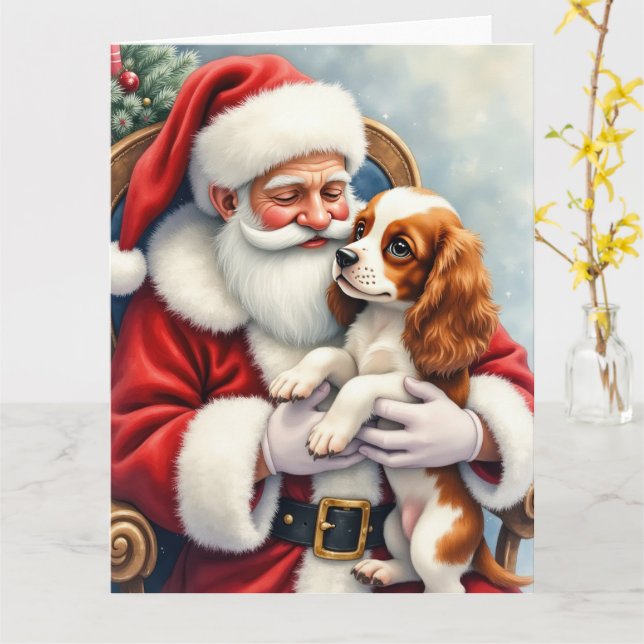 Cartão Papai Noel segurando Cavalier King Charles Spaniel (Flor Amarela)