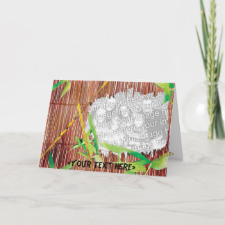 Cartão Paraíso através de uma cerca de bambu